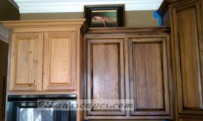 Antiqued Cypress Cabinets And Black Distressed Island Fauxscapes Glazed Kitchen Cabinets Restaining Kitchen Cabinets Stained Kitchen Cabinets