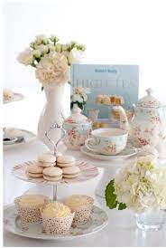Macarons Cupcakes Flowers All Setting The Scene For A Lovely High Tea Ceremony High Tea High Tea Baby Shower Bridal Shower Champagne