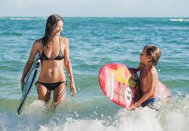 From pro surfer to swimwear designer and mom: From Pro Surfer To Swimwear Designer And Mom Malia Jones O Loughlin Does It All