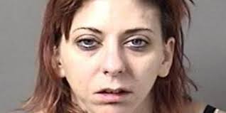 Police find gun, drugs, cash in raid