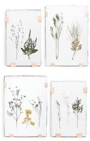 Let the flowers stay in the book overnight. Floating Glass Frames Let You Quickly Display Art Apartment Therapy