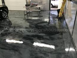 A diyer can epoxy a floor for only a few dollars per square foot. Cost Of Epoxy Residential Epoxy Garage Flooring Prices In Houston