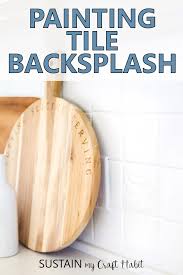 We went in there to order our gorgeous stone floor for the utility room and came out with the car full of these beautiful artisau gloss tiles in white for the kitchen (similar option here. Painting Tile Backsplash Bye Bye Ugly Kitchen Tiles Sustain My Craft Habit