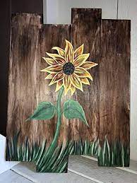 While paint completely coats the wood, a stain penetrates the wood grain, but it does not form a solid coating on top as paint does. Amazon Com Wicked Women 100 Hand Painted Sunflower Picture Acrylic 14x19 On Wood Slats Antiqued Wood Wall Art Rustic Home Decor Handmade