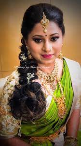 15 Popular South Indian Bridal Hairstyles For Engagement Tbg Bridal Store In 2020 Indian Bridal Makeup Pakistani Bridal Hairstyles Bridal Makeup