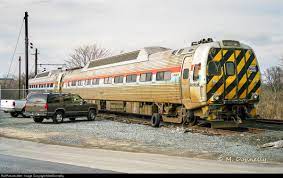A 9800 Series Cab Car With The Old Dynamic Brake Grids On The Roof And Clam Shell Door Sits In Storage At Wilmington Delaware Maybe Someone T Amtrak Cab Train