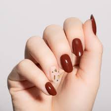 Matte black nail designs on pinterest. Get Chic Thanksgiving Nail Art With Rust Brown Polish Gold Charms Lulus Com Blog