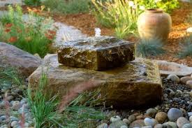 Pebbles can serve other purposes 16 Landscape Ideas That Use Water Features Hgtv