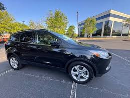 Image result for Tuxedo Black 2013 Escape