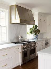 50 Favorites For Friday Kitchens With Brass Accents South Shore Decorating B Shaker Style Kitchen Cabinets Kitchen Hood Design Replacing Kitchen Countertops