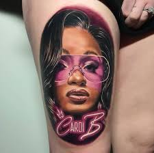 It is the abbreviation of her real name, belcalis. Cardi B Fan Gets Massive Tattoo Of The Rapper S Face Pics