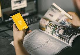 Download Man Holding Iphone With Magazine Mockup Psd At Downloadmockup Com Download Free Mockups Magazine Mockup Psd Iphone Mockup Free Magazine Mockup