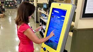 The tall yellow machine is a coinstar exchange kiosk where you can convert gift cards to cash in a few minutes. Gift Card Exchange Kiosk