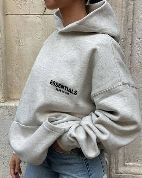The signature boxy silhouette and relaxed, dropped-shoulder draping of an authentic Essentials piece., AI generated