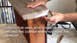 In order for the vinyl to conform to the other contours in the surface (the wheel wells on the board), a heat gun must be implemented. Dresser Re Cover With Contact Paper Contact Paper Diy Dresser Makeover Diy With Contact Paper