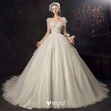 Audrey hepburn (born audrey kathleen ruston; Audrey Hepburn Stil Champagner Brautkleider Hochzeitskleider 2019 Ballkleid Rundhalsausschnitt Spitze Blumen Kurze Armel Ruckenfreies Kathedrale Schleppe