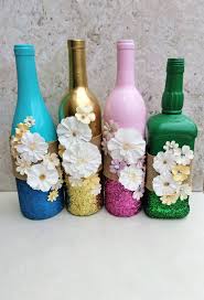Centerpiece With Flowers Spring Wine Bottles Flower Decor Etsy In 2020 Bottles Decoration Wine Bottle Diy Crafts Wine Bottle Decor