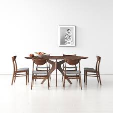 The traditions dining collection by hanover includes 6 stylish and comfortable cushioned cast aluminum swivel rocker chairs and 38x72 cast aluminum table. 7 Piece Dining Set Reviews Allmodern