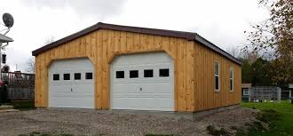 Each of our metal garage designs offers many different custom size options with widths up to 70 feet and almost limitless lengths. Ontario S Prefab Custom Garages North Country Sheds
