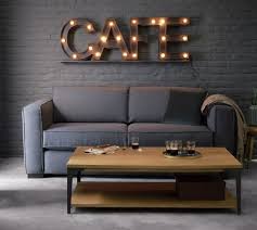 You can always enhance the look and feel the mango wood pedestal table by cotton craft is hand carved and handcrafted and comes in an antique brown color. Solid Mango Wood And Metal Coffee Table Metropolis Maisons Du Monde