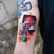 Knuckles collage tattoo located on the inner arm.
