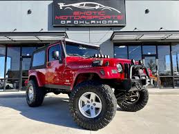 Image result for Flame Red 2006 Jeep