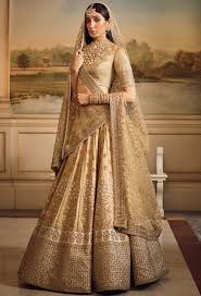 Sabyasachi Inspired Beige Bridal Lehenga Choli Sf9120 Indian Bridal Dress Indian Bridal Outfits Golden Bridal Lehenga Fine art silk sabyasachi bridal lehenga cream color in digital print with dori,sequins embroidered border and pearl work.
