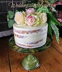 Birthday cake with fresh flowers on top. Naked Cake Designs Embellished With Fresh Flowers