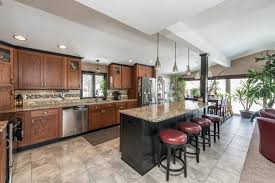 This gap would typically be covered up by the baseboard molding. Wall Removal For A Sizzling New Kitchen Remodel In Peoria Central Illinois New Kitchen Island Opens Up To Living Room And Dining Room