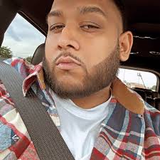 What tattoo shop will pierce an 8-year-old's ears without using a gun?