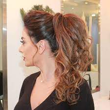 Among all the ponytail styles, we couldn't simply skip this wavy elegant one. 30 Eye Catching Ways To Style Curly And Wavy Ponytails