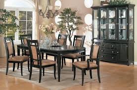 It features a table with a 48 inch round glass top supported by an espresso finished base. Dark Espresso Finish Contemporary Formal Dining Room W Options
