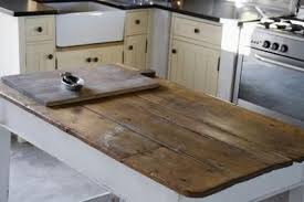The Best Way To Seal A Wood Table Top Ehow Wood Countertops Kitchen Rustic Kitchen Wood Countertops
