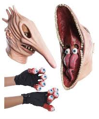 You can tell by the look on her face how much she's loving it. Prepare To Win Halloween With These Beetlejuice Barbara And Adam Masks Accessories Beetlejuice Halloween Beetlejuice Costume Beetlejuice