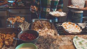 Chafing dishes or steam tables can be used to keep hot foods hot. Why We Eat Certain Foods On Thanksgiving Mental Floss