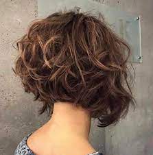 However, the extra dramatic curls have been replaced with equally theatrical waves whereas the addition of a prominent balayage gives a greater visual. The Chicest Layered Haircuts For Any Hair Type Fashionisers C Part 8 Short Layered Curly Hair Short Hairstyles For Thick Hair Short Curly Haircuts