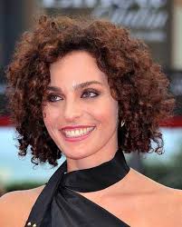 Besides adding tons of fullness, these long layers will also enhance the texture. 15 Short Haircuts For Curly Frizzy Hair