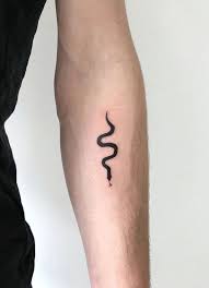 Simple Solid Black Snake Tattoo Done By Bocharovdima In Ukraine Www Otziapp Simple Solid Black Sn Black Snake Tattoo Snake Tattoo Small Snake Tattoo