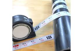 Both models are white with black lines (except the 1/16 marks on the fastcap are red. Fastcap Flatback Lefty Righty Tape Measure 16 Standard Reverse
