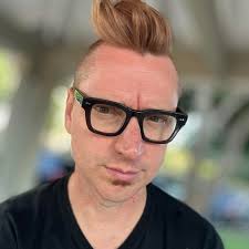 Anyone know the story behind Dale Watson's Tele? What's with the coins  glued to it?