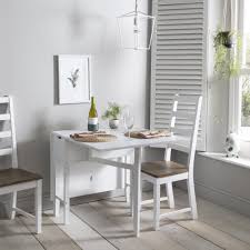 You can bust them out to fit more people around the table for game night, or hang. Gustav Folding Dining Table With Drawer Noa Nani