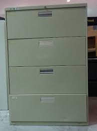 In fact, you will need a partner's assistance to remove the drawers from your hon cabinet. Hon 4 Drawer Lateral Metal File Cabinet Office Furniture File Cabinets And More Hon Steelcase Hirsh Staples Tennsco Equip Bid