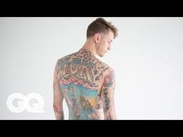 Machine gun kelly reveals his new throat tattoo on social media. The Late Night Ink Of Machine Gun Kelly Tattoo Tour Gq Youtube