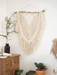 It hangs from a unique sea smoothed piece of driftwood. 20 Boho Wall Hangings That Will Complete Any Room Green Wedding Shoes