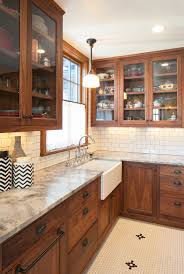 We installed molding on top of the existing cabinet boxes to raise the height about 8 inches and trimmed it out with boxed molding. Cherry Cabinets In My Kitchen