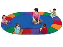 If you're decorating a small space, round or oval kids' rugs generally work best. A Place For Everyone Circle Time Carpets At Lakeshore Learning