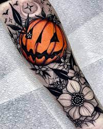 Yellow haloween pumpkin of the left forearm. Pin By Kat Voorhees On Tattoos Piercings Pumpkin Tattoo Halloween Tattoos Tattoos