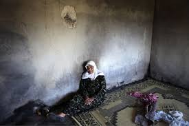 Image of NAJLA HARB MOURNS AT THE FUNERAL OF HER SON FARID