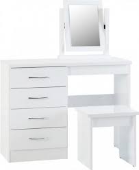 Recognised by many as essential bedroom furniture, white vanity table designs have overtaken classic pine and oak dressing tables when it comes to stylish bedroom storage solutions. Nevada 4 Drawer Dressing Table Set White Gloss
