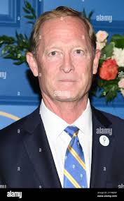 International Tennis Hall of Fame CEO Todd Martin, left, board member Peggy  Woolard, center, and Brad Parks during the induction ceremony at the hall  of fame in Newport, R.I., Saturday, July 18,